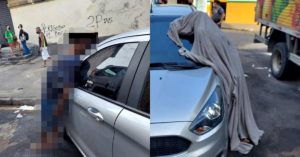 Homem morre em pé - encostado carro